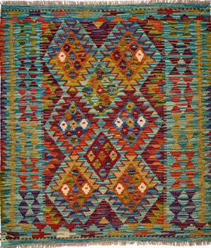 Handwoven Kilim Kelim Chobi rug with intricate patterns, crafted by Orientmattor, showcasing traditional craftsmanship and vibrant colors.