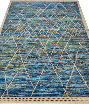 Handwoven Gabbeh rug Moracco No.65989 by Orientmattor, showcasing intricate patterns and warm colors in a close-up shot.