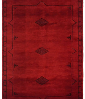 Orientmattor Bokhara 64593 Afghan/Pakistan rug with intricate geometric patterns and rich earthy tones, close-up view of woven design.