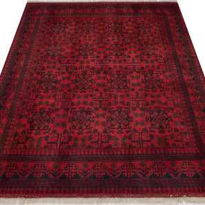 Handwoven Afghan-Pakistan rug with intricate patterns, from Orientmattor, featuring vibrant colors and detailed traditional design.