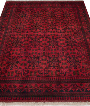 Handwoven Afghan-Pakistan rug with intricate patterns, from Orientmattor, featuring vibrant colors and detailed traditional design.