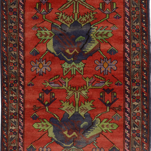 Orientmattor Baluch 64783 classic carpet with intricate geometric patterns in warm tones, detailed close-up of woven textile.