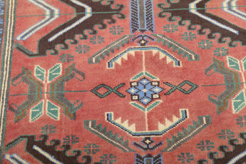 Orientmattor Baluch 64789 classic carpet featuring intricate traditional patterns in rich colors, displayed on a neutral background.