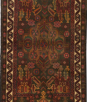 Orientmattor Baluch 64792 classic carpet with intricate geometric patterns and rich colors, close-up of detailed woven design.
