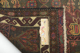 Orientmattor Baluch 64792 classic carpet with intricate patterns and rich colors, showcasing traditional craftsmanship.