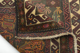 Orientmattor Baluch 64792 classic carpet featuring intricate traditional patterns and rich colors, shown in a detailed close-up image.