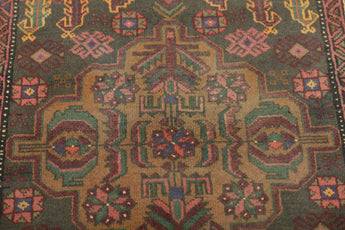 Orientmattor Baluch 64792 classic carpet with intricate patterns in warm tones, detailed close-up of traditional woven design.