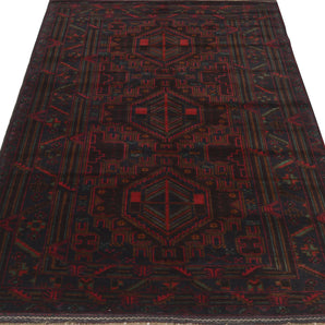 Orientmattor Baluch 64804 classic carpet with intricate geometric patterns and rich colors, detailed close-up view.
