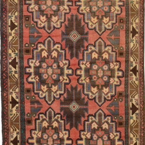Orientmattor Baluch 64811 classic carpet with intricate traditional patterns and rich colors, displayed on a neutral background.