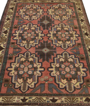 Orientmattor Baluch 64811 classic carpet featuring intricate traditional patterns in rich, warm colors.