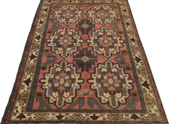 Orientmattor Baluch 64811 classic carpet featuring intricate traditional patterns in rich, warm colors.