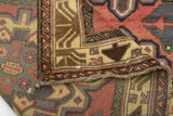 Orientmattor Baluch 64811 classic carpet with intricate traditional patterns in rich, warm colors, showcasing detailed craftsmanship.