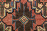 Orientmattor Baluch 64811 classic carpet with intricate geometric patterns in warm tones, showcasing traditional craftsmanship.