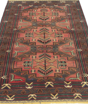 Orientmattor Baluch 64813 classic carpet featuring intricate traditional patterns and rich colors on a woven textile background.