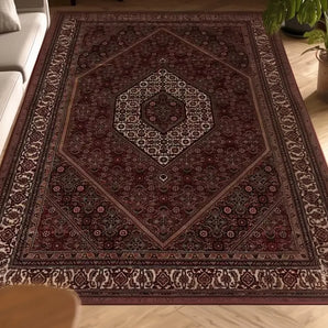 Orientmattor Bidjar 55195 classic carpet on a wooden floor, showcasing intricate patterns and rich colors.