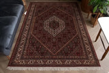 Classic Bidjar 55195 carpet by Orientmattor, showcasing intricate patterns on a wooden floor background.