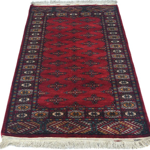 Handknuten Bokhara Oriental rug from Orientmattor, 122x77 cm, featuring traditional geometric patterns and rich woven details.