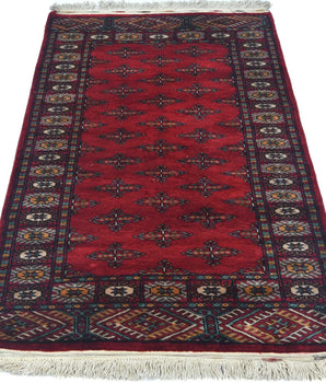 Handknuten Bokhara Oriental rug from Orientmattor, 122x77 cm, featuring traditional geometric patterns and rich woven details.