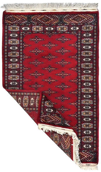Handknuten Bokhara Oriental rug by Orientmattor, 122x77 cm, showcasing intricate traditional pattern and rich colors.