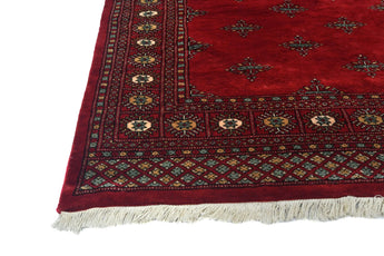 Orientmattor handknuten Bokhara Oriental rug, 235x159 cm, showcasing intricate traditional patterns and rich colors.