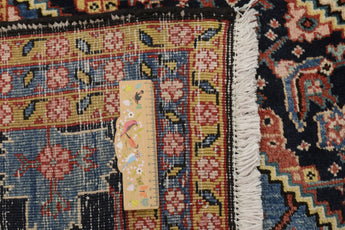 Handwoven Heriz Persian carpet, 323 x 235 cm, classic Orientmattor rug with intricate patterns and rich colors.