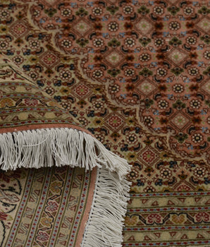 Handknuten Tabriz Oriental carpet by Orientmattor, 298x200 cm, classic woven design with intricate patterns and rich colors.