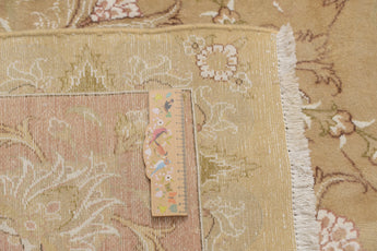 Handknuten Tabriz Oriental carpet from Orientmattor, 338x240 cm, with intricate traditional pattern and rich colors.