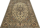 Orientmattor Kashan 61766 classic carpet with intricate patterns and warm colors, detailed close-up of woven textile design.