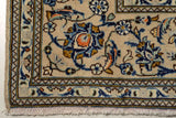 Orientmattor Kashan 61766 classic carpet with intricate floral patterns and warm tones, shown in a detailed close-up image.