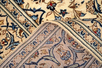 Orientmattor Kashan 61794 classic carpet with intricate floral patterns on a rich, warm-toned background.
