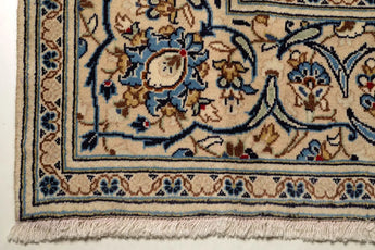 Orientmattor Kashan 61794 classic carpet featuring intricate traditional patterns and rich colors, shown in a detailed close-up image.