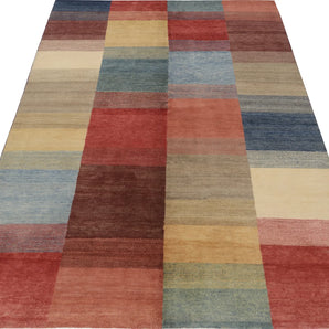 Orientmattor Gabbeh 65015 design carpet with intricate patterns and warm colors, showcasing traditional craftsmanship and textured weave.