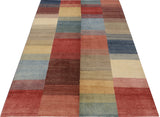 Orientmattor Gabbeh 65015 design carpet with intricate patterns and warm colors, showcasing traditional craftsmanship and textured weave.