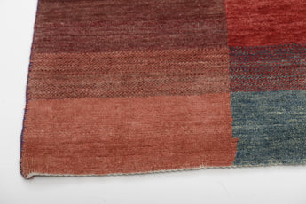 Orientmattor Gabbeh 65015 design carpet with intricate patterns and rich colors, showcasing traditional woven craftsmanship.