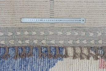Orientmattor Moroccan 64886 design carpet featuring intricate patterns and vibrant colors on a cozy floor setting.