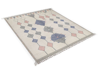 Orientmattor Moroccan design carpet featuring intricate patterns and rich colors, perfect for home decor enhancement.