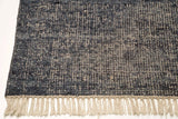 Orientmattor Vinto 53499 design carpet with intricate pattern in shades of beige and brown, displayed on a wooden floor.