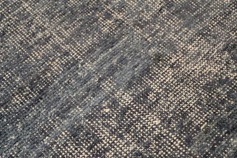 Orientmattor Vinto 53499 design carpet with intricate patterns and rich colors, displayed in a well-lit living room setting.