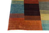 Handwoven Gabbeh rug by Orientmattor, 174x113 cm, featuring traditional oriental patterns and rich, earthy colors.