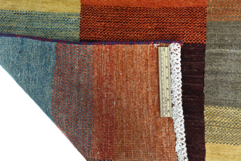 Orientmattor Gabbeh handknuten matta, 174x113 cm, with traditional oriental design and vibrant woven pattern.