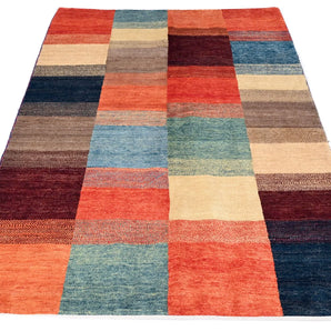 Handknuten Gabbeh oriental rug by Orientmattor, 174 x 117 cm with traditional geometric patterns and warm earthy tones.