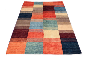Handknuten Gabbeh oriental rug by Orientmattor, 174 x 117 cm with traditional geometric patterns and warm earthy tones.