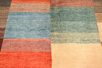 Handknuten Gabbeh Oriental rug by Orientmattor, 174x117 cm, featuring intricate traditional patterns and warm woven colors.