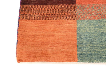 Handknuten Gabbeh Oriental rug by Orientmattor, 174x117 cm with intricate geometric patterns and warm earthy tones.
