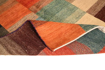 Handknuten Gabbeh Oriental rug by Orientmattor, 174 x 117 cm, featuring traditional geometric and colorful patterns.