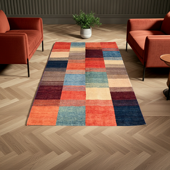 Handwoven Gabbeh Oriental rug by Orientmattor, 174x117 cm with intricate geometric patterns and warm earthy tones.