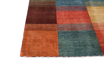Orientmattor Gabbeh handknuten matta, 193x148 cm, with traditional oriental patterns and rich, warm colors.
