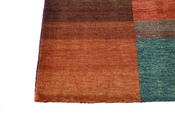 Handwoven Gabbeh Oriental rug by Orientmattor, 195 x 147 cm, featuring traditional geometric patterns and rich colors.