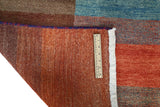Handknuten Gabbeh Oriental rug by Orientmattor, 195 x 147 cm, featuring traditional geometric patterns and rich earthy tones.