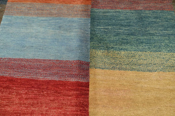 Orientmattor Gabbeh oriental handknuten matta, 229x168 cm, intricate woven design with warm earthy tones.